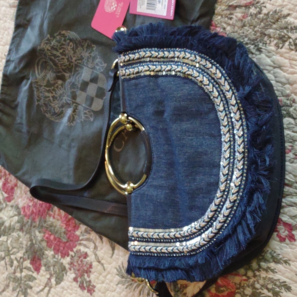 Vince Camuta leather and jean bag with silver sequin and colored trim.
